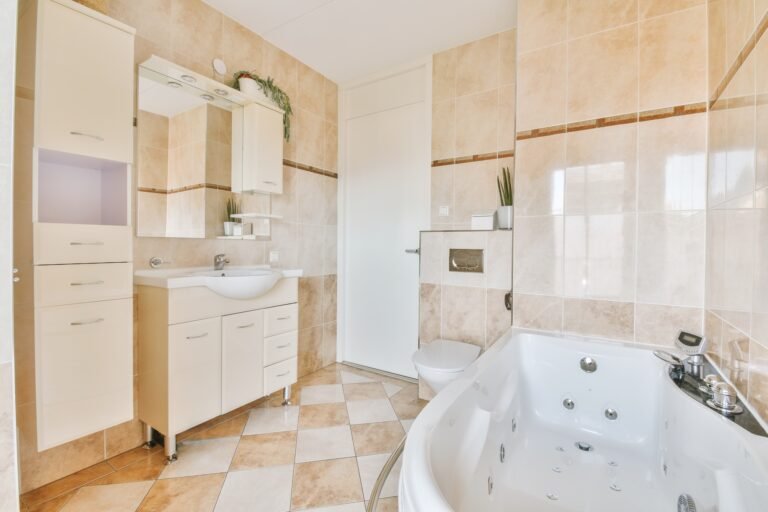 Bathroom interior finished with marble tiles